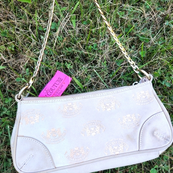 Juicy Couture Handbags - 🤎Juicy Couture 100% suede beige baguette 🤎👜